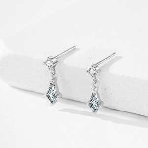 French vintage 925 silver earrings with diamond-shaped zircon stones on white stone
