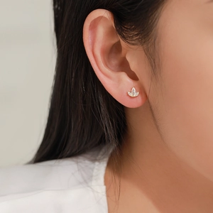 Elegant gold plated S925 silver clover earrings with marquise cut zircon on female model