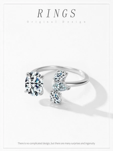Detail view of oval and pear-shaped crystals on an adjustable silver open ring band