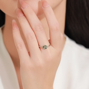 925 sterling silver ring featuring three marquise green gemstones in leaf design