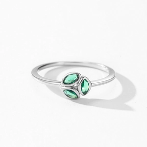 925 sterling silver ring with three marquise-cut green emerald stones in leaf shape