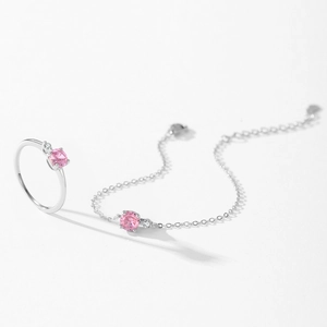 Elegant S925 sterling silver jewelry set featuring pink crystal ring and bracelet