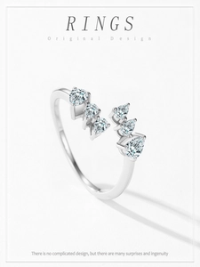 Detailed macro view of an S925 sterling silver open ring with pear-cut shimmering stones
