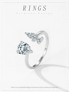 Macro detail of S925 sterling silver open ring featuring a pear-cut cubic zirconia stone