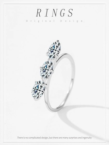 Detailed macro view of S925 sterling silver ring with three oval-cut brilliant gemstones