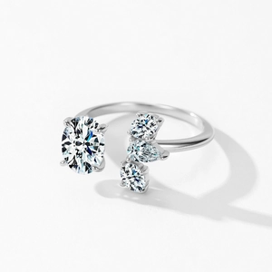 925 sterling silver open ring with oval cut main stone and pear shaped side accents