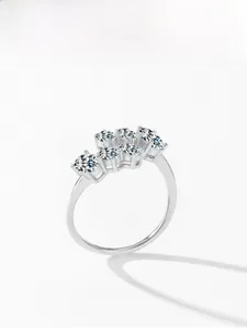 Detail showing seven round-cut cubic zirconia stones on a S925 sterling silver ring