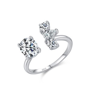 Adjustable 925 sterling silver ring with oval and teardrop shaped cubic zirconia stones