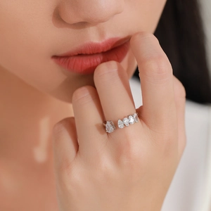 French style 925 silver open ring with 5 pear-cut sparkling diamonds on model finger