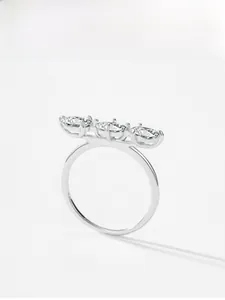 Detailed macro view of S925 silver ring featuring three oval-cut brilliant zircons