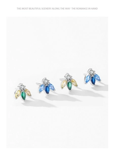 Detailed macro view of S925 silver stud earrings with colorful marquise-cut zircons