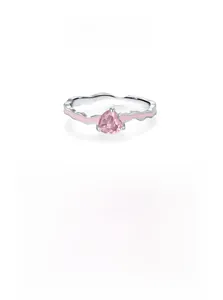 Close-up of S925 sterling silver ring featuring wave band and pink heart zircon
