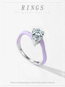 Detailed view of pear-cut zircon ring with light purple enamel on 925 sterling silver band