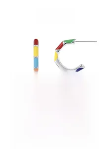 Macro detail of 925 sterling silver C-shape earrings with colorful enamel sections