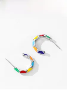 Detailed shot of S925 sterling silver C-shape earrings with colorful rainbow enamel inlay
