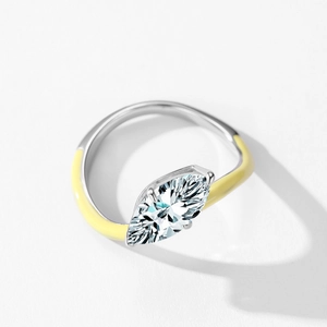 Elegant 925 silver marquise diamond ring with yellow enamel accents on white background