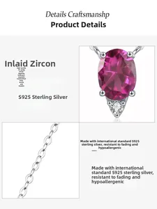 Macro detail of S925 sterling silver necklace with oval garnet zircon and small diamond