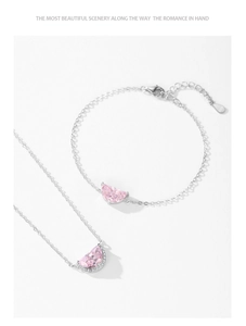 Macro detail of S925 sterling silver hallmark and pink crescent zircon jewelry set