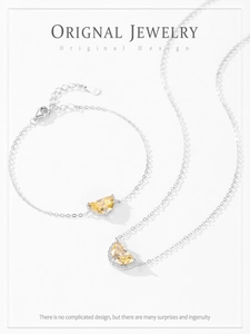Detailed macro view of S925 sterling silver jewelry set featuring yellow moon stones