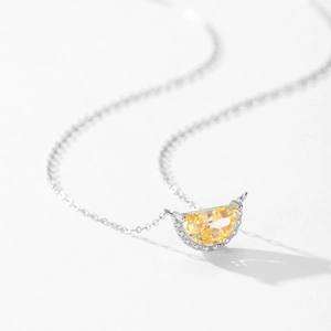 Elegant 925 sterling silver necklace with half-moon yellow gem and white zircons