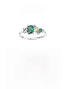 Macro shot of S925 sterling silver stamp on geometric ring with emerald and yellow stones