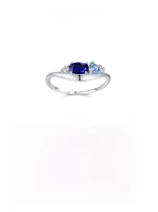 Detail of S925 silver wave ring with blue gemstones and micro-inlaid zircons