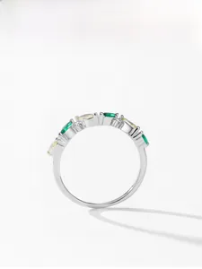 Detailed close-up of S925 silver leaf ring with sparkling green and yellow marquise zircon