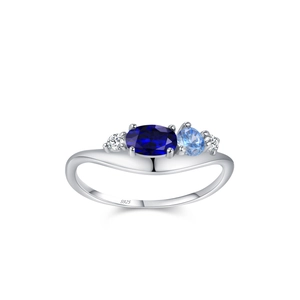 S925 sterling silver ring with oval blue sapphire and asymmetrical diamond accents
