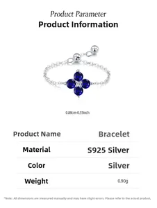 Detalle de anillo de cadena en plata S925 con trébol de la suerte azul de cuatro hojas