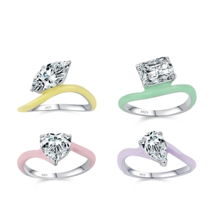 Set of four S925 silver rings with colorful enamel and assorted gemstone shapes