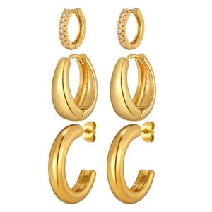 Three-piece set of polished golden hoop earrings including minimalist studs and zircon rings
