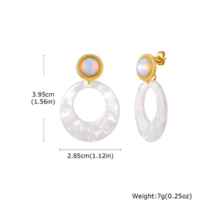 Detailed view of gold plated earrings with opal effect beads and white marble rings