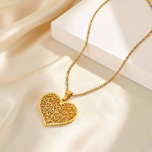 Golden tree of life hollow heart pendant necklace with elegant chain on satin
