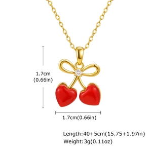 Élégant collier cerise doré avec pendentifs cœurs rouges et nœud, dimensions incluses