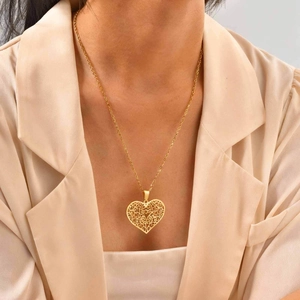 Elegant gold hollow heart pendant necklace with tree of life design for women fashion