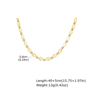 Gouden ketting met ovale schakels en witte stras-ringen inclusief afmetingen 40+5cm