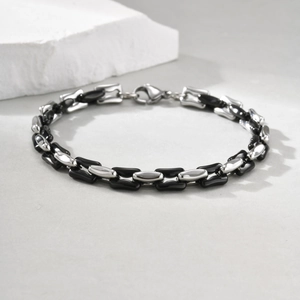 Minimalist silver cuban chain bracelet for men featuring black rectangular resin links