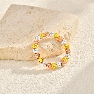 Three-tone faceted copper beads ring in gold, silver, and rose gold with sparkle finish