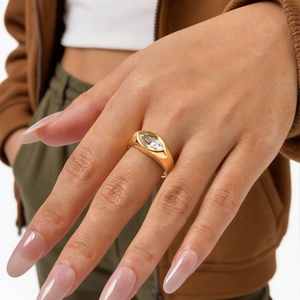 Polished gold wide band ring featuring a marquise-cut white zircon for women
