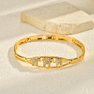 Detailed close-up of 24K gold plated elephant bracelet with pavé cubic zirconia inlay