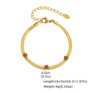 Detail of gold snake chain bracelet with rose charms and K18 hallmark extension