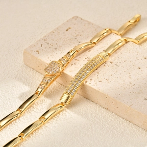 Gold-plated chain bracelets with pavé zircon heart and rectangular charms on stone
