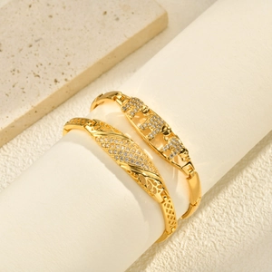 Elegant 24K gold-plated elephant link bracelet with shimmering zircon stones for women