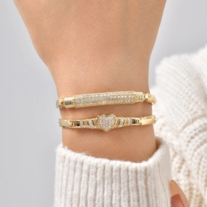 Minimalist gold plated heart and rectangle zircon bracelet set worn on wrist