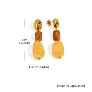 Detailed size view of asymmetric geometric earrings with amber resin and gold metal