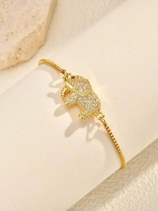 Macro detail of elephant charm bracelet with colorful cubic zirconia on box chain