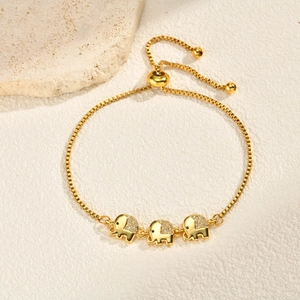 Detailed shot of an adjustable gold elephant bracelet with sparkling zirconia inlay