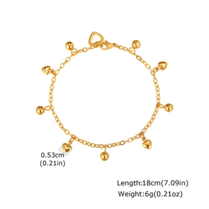 Detailed view of golden heart and bead charms on 18cm stainless steel chain bracelet