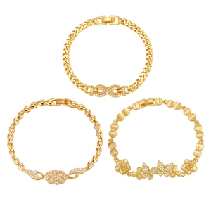Three 24K gold plated bracelets featuring infinity, floral, and butterfly charms with zircons