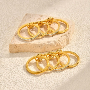 Interlocking triple gold ring sets with pavé rhinestones and matte textured finish